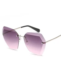 

Ocean Lens Trendy Eyeglasses Sun Glasses Women's Rimless Metal Sunglasses