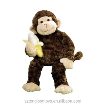 stuffed monkey holding a banana