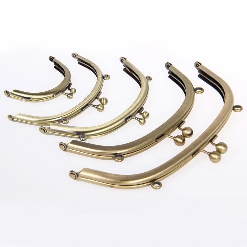 

Glued Metal Frames Purse Frames in Antique Brass Color Without Holes in Stock