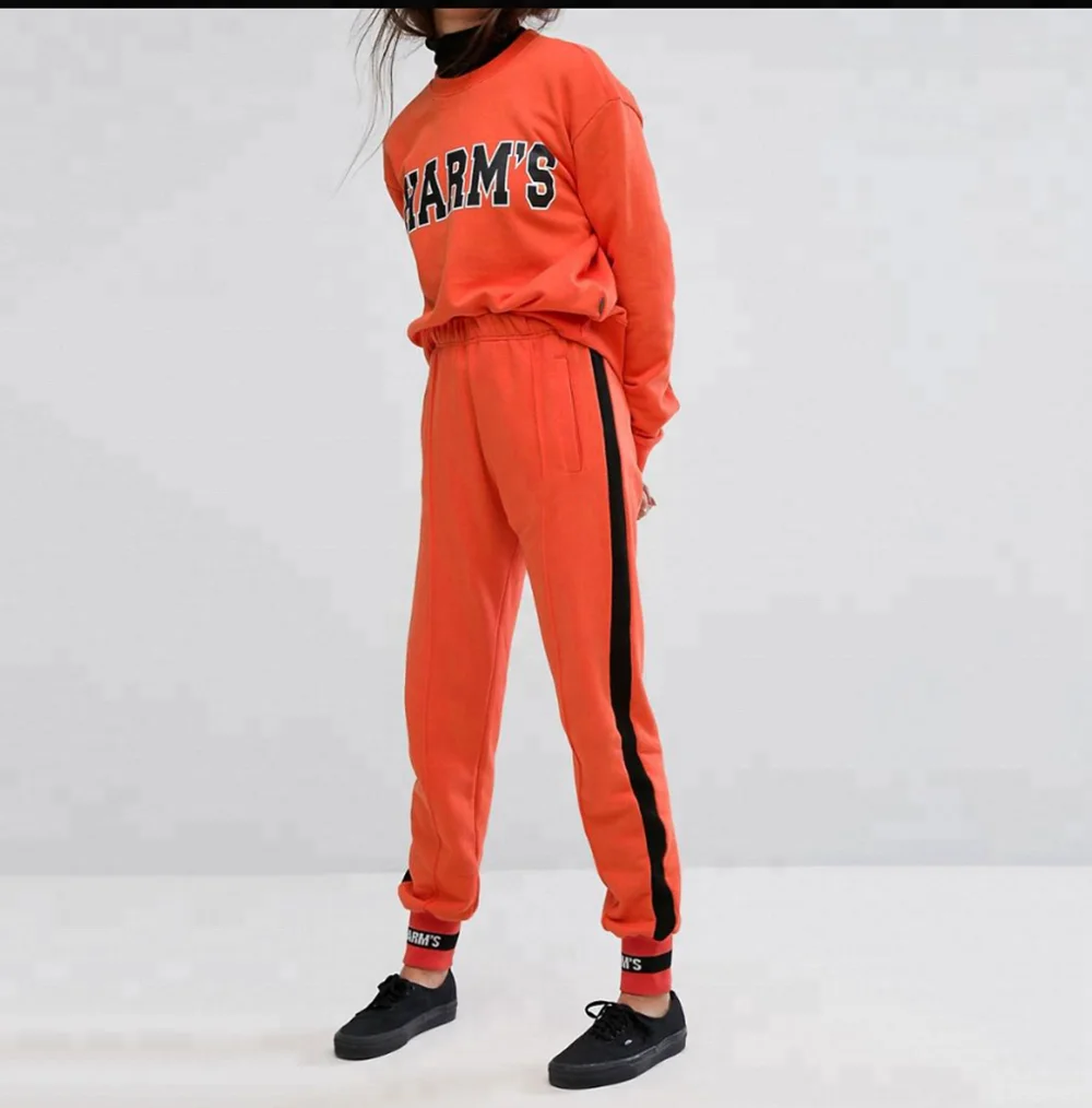 orange nike tracksuit womens