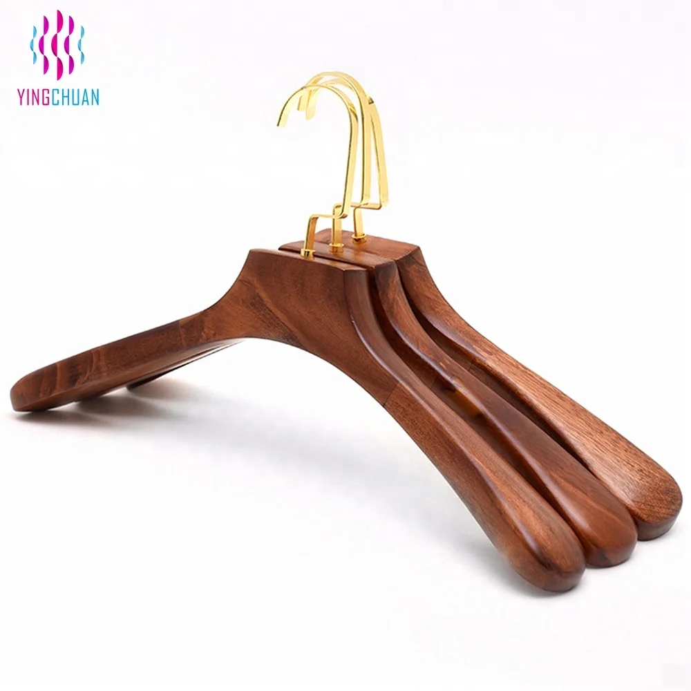 wood hanger with gold hook wood hanger with gold hook