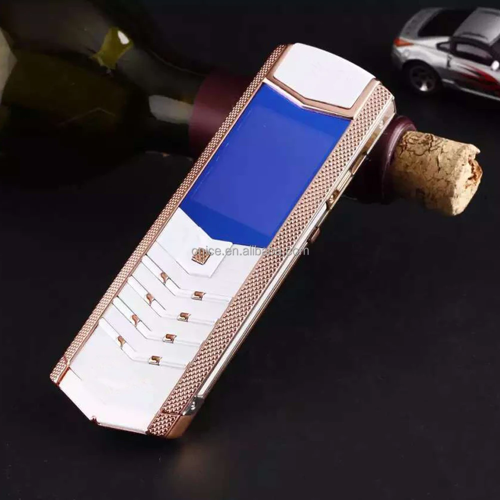 

unlocked GSM luxurious diamond V9 china phone with leather case dual sim one camera E0414 chinese phones