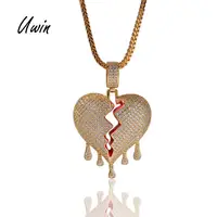 

Wholesale Trendy Copper Iced Out Broken Heart Drip Couple Pendant Gold Chain Necklace for Men Charms Brass Jewelry