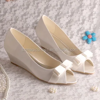 white wedge heels with bow