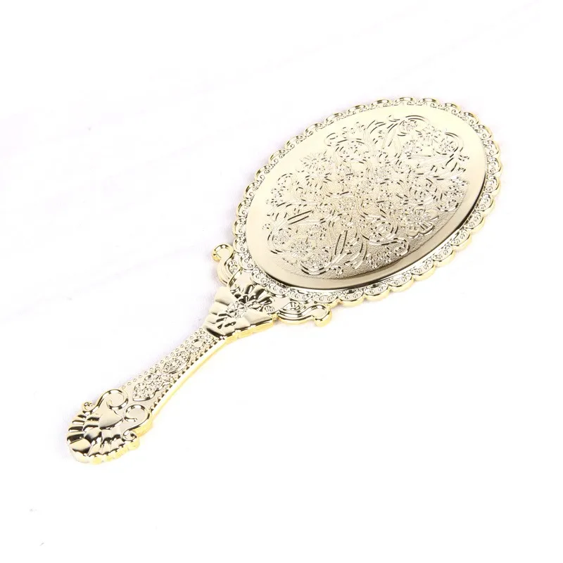China Wholesale High Quality Rose Gold Oval Plastic Long Handle Cosmetic Hand Mirror Buy Hand