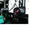 Laser blowing stop motion device for warp knitting machine