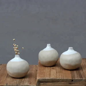 Image of Natural clay with white reactive glaze small ceramic stoneware vase for home deco
