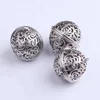 silver big alloy hollow ball pendant with little bell for pet