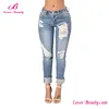 Stylish tight light blue ladies jeans pants with holes