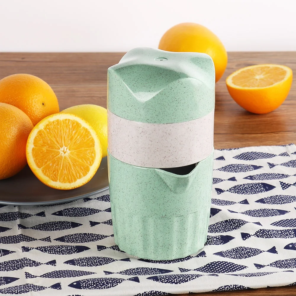 

Plastic Orange Juicer Squeezer Citrus Juicer Hand Press Portable, Green and white