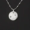Cute necklace yin yang magnetic Anion Far infrared stainless steel locket pendant