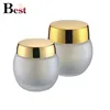 luxury cosmetic packaging 50ml 100ml oval frosted cosmetic glass jars honey jars with gold cap