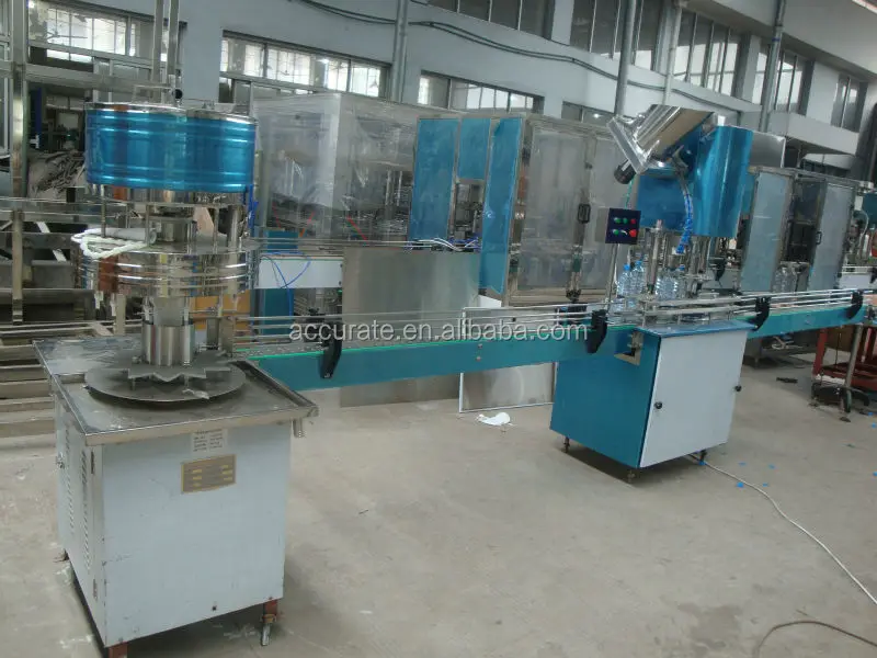 Manual Rotary Gravity Liquid Filling machine with Auto Capping machine Low Cost High Efficiency