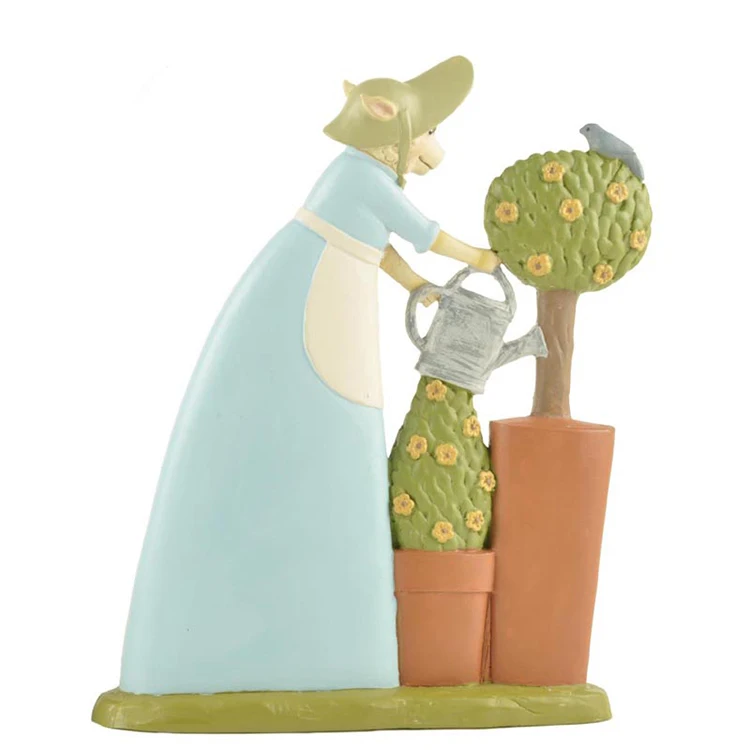 Figurine of a custom-made resin Easter bunny watering tree
