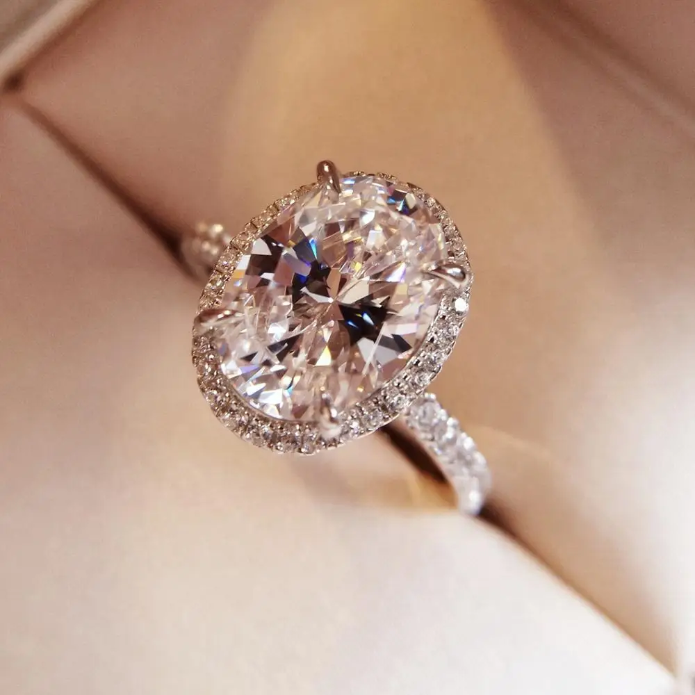 Pigeon egg diamond ring European fashion S925 sterling silver gold plated 3 carat oval water drop simulation diamond ring