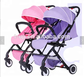 pink and blue double stroller