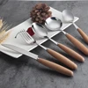 /product-detail/elegant-wood-handle-spoon-knife-fork-engraved-cutlery-wooden-flatware-set-62038447745.html