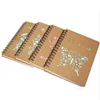 Promotional plain a5 recycled hollow out kraft paper cover sprial notebook with customized logo