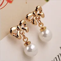 

2019 Korean Edition Hot Selling Ear Nails Cute Butterfly Knot Gold-plated Hanging High Bright Pearl Earrings for women