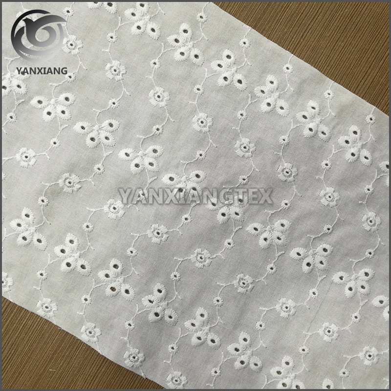 white eyelet lace fabric