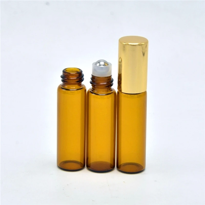 

Essential oil roller bottle with golden capglass roller bottle