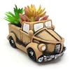 /product-detail/oem-cheap-mini-truck-shape-cement-concrete-succulent-planter-flower-pot-62191159586.html