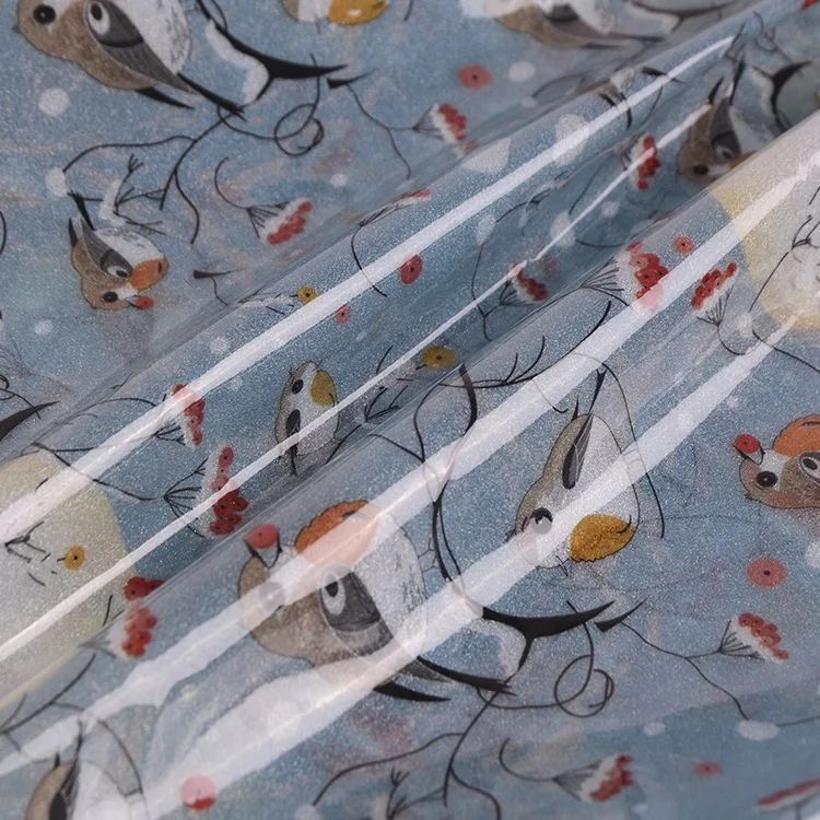 
Waterproof polyester bird flower moon digital printed translucent tpu fabric for raincoat rainshoes 