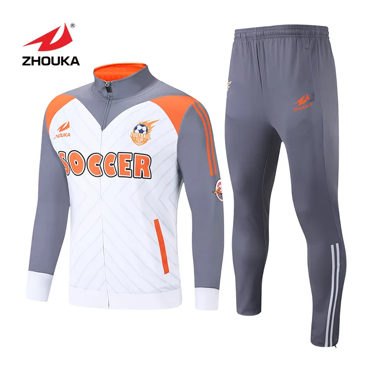 grey and orange tracksuit