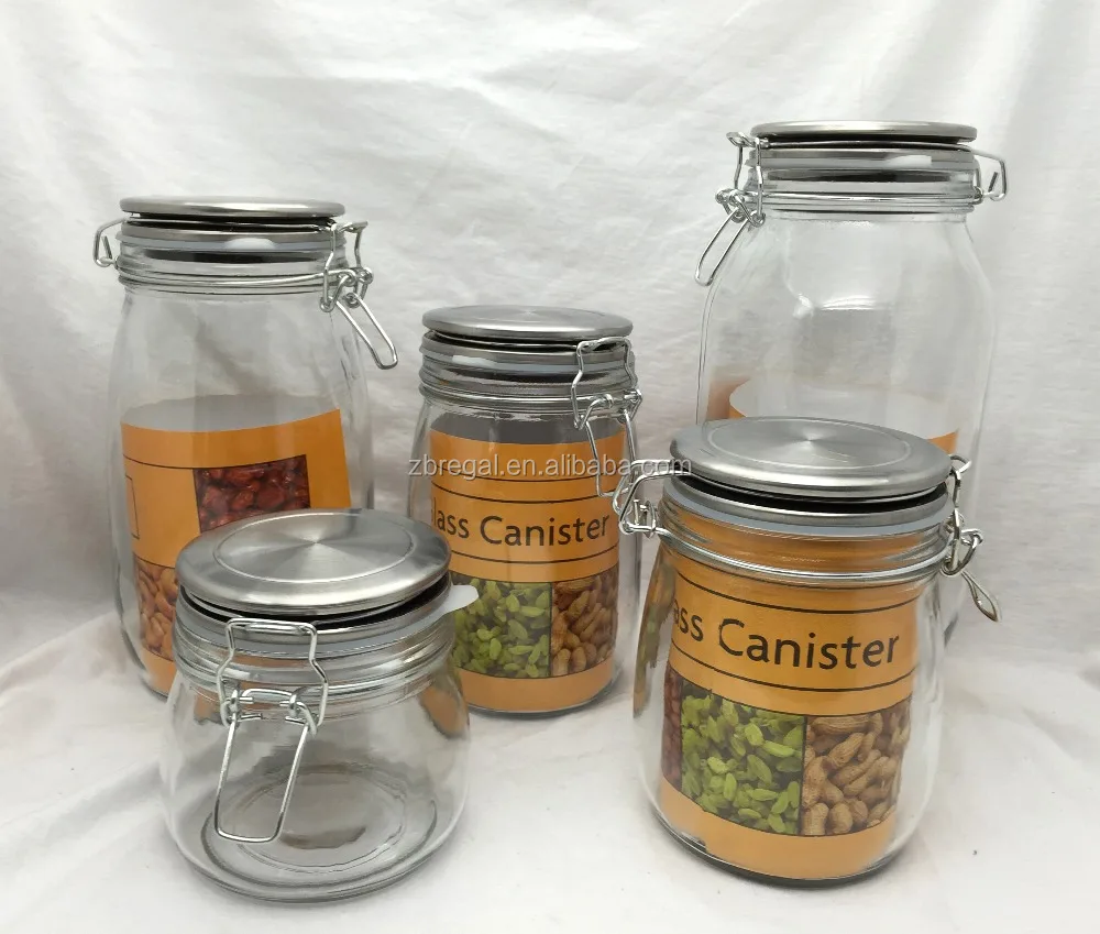 
Glass storage jar with metal lid and clip and color paper 