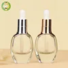 flat round shape glass cosmetic bottles metal dropper cap essential il glass dropper bottle