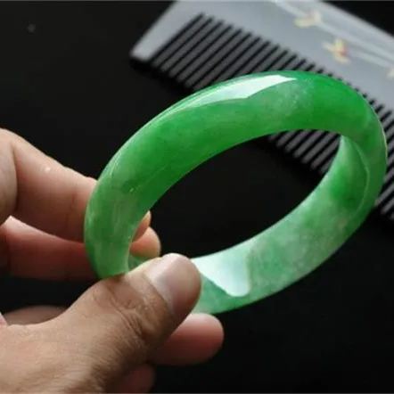 

Icy emerald green jade bangle bracelet