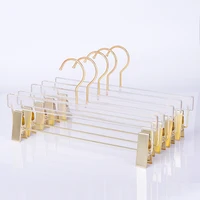 

Custom Adjustable Transparent trousers skirt hangers clear Acrylic Display Pant Hanger with Golden Clips