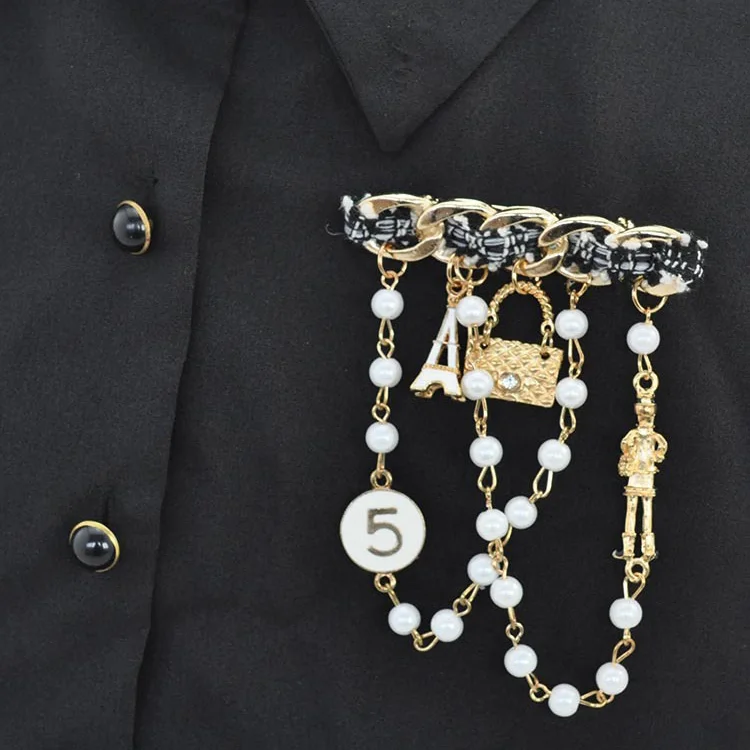

Classic fashion crystal number 5/Tower/Bag/Doll Shaped pendant pearl tassel cloth Metal chain brooch for Unisex badge brooch pin