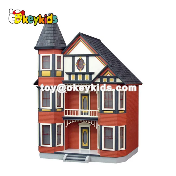 pink wooden dolls house