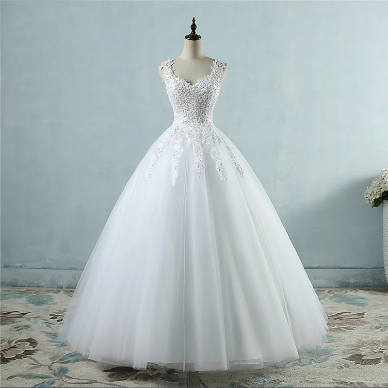 

Real Photo Wedding Dress Sexy Backless Handcraft Pearls Spaghetti Strap V-neck Appliqued Lace Lace up Ball Gown Wedding Dress, Off white