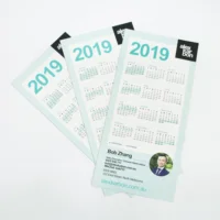 

Custom shaped real estate calendar magnet