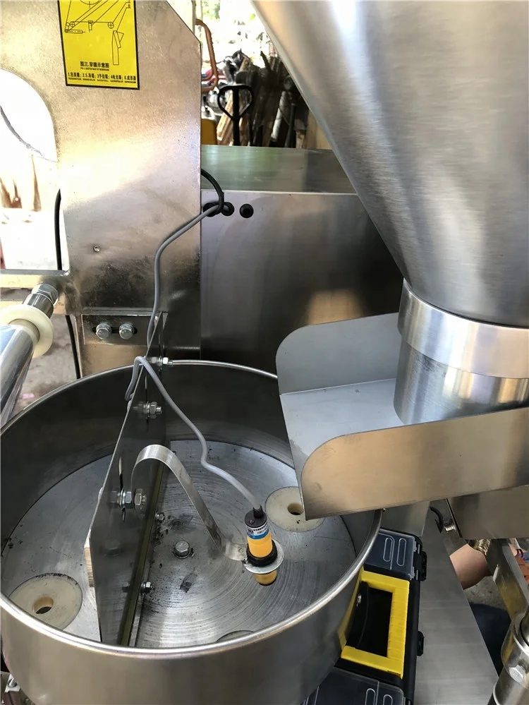 
Shanghai Factory Vertical FFS Volumetric Cup Filler Granules automatic packing machine 