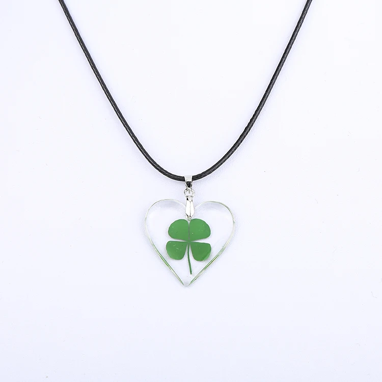 Necklace, resin/four-leaf clover/cotton, green/clear/black