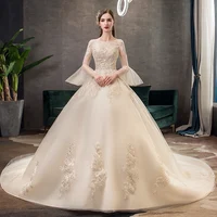 

Luxury Champagne Color Elegant Lace Decorate Wedding Dresses Turkey Istanbul Long Tail Ball Gown Wedding Dress