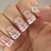24PCS Pretty floral scroll nails are dainty and delightful. Painted over a neutral French tip