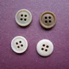 Urea button for formal suit
