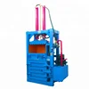 Small portable vertical hydraulic solid waste compactor