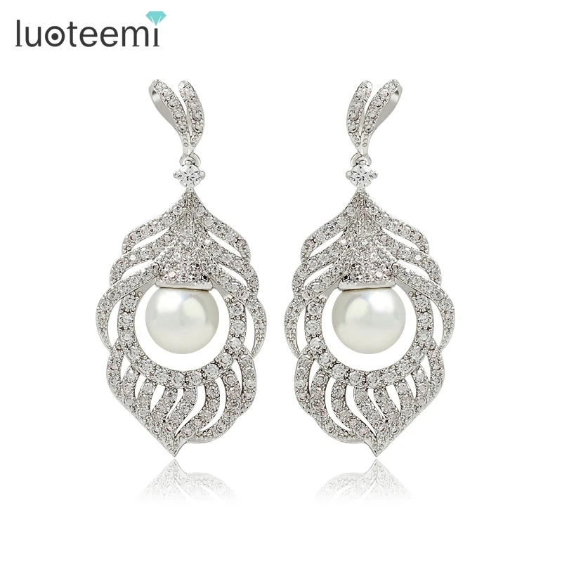

LUOTEEMI Luxury AAA Cubic Zirconia Micro Paved Sea Shell Pearl Feather Heavy Dangle Earrings Bridal For Sexy Women Jewelry, N/a