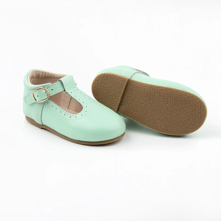 green baby shoes