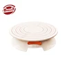 Bakest White Plastic Revolving Rotating cake stand with Fixed Switch and Clear Scale