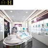 Top quality make up products display rack cosmetic shop interior design