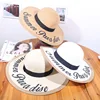 New printed letter sun hat straw hat ladies spring summer beach cap with black ribbon