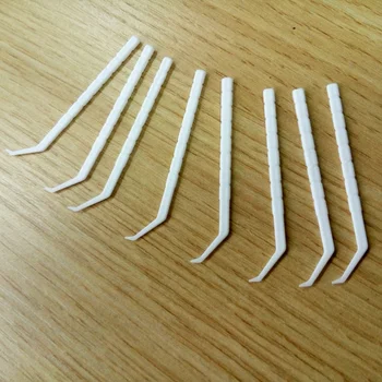 white plastic toothpicks