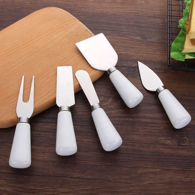 

Wholesale cheese knife set cheese knife with porcelain handle, Silver+ white