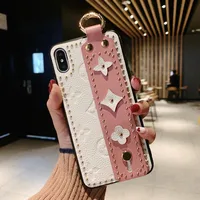 

Super Luxury Fashion Lady Style Wrist Holder Genuine Leather Back Rivet Phone Case for iPhone 11 Pro Max 6 7 8 X XS XR XS Max